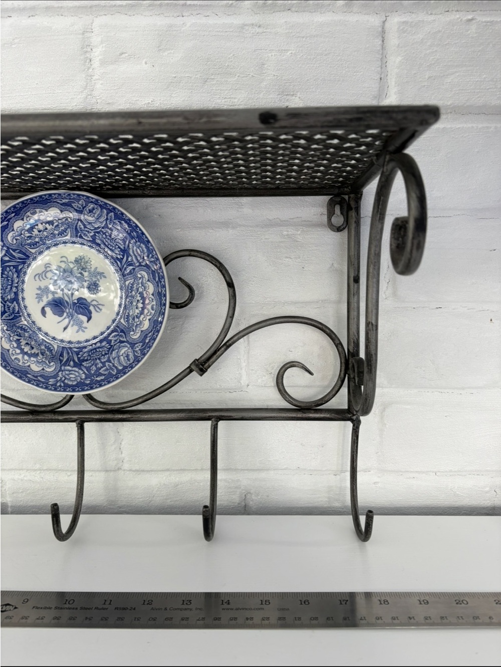 Black Wrought Iron Wall Shelf with Hooks and Decorative Blue Plate - Picture 5 of 12
